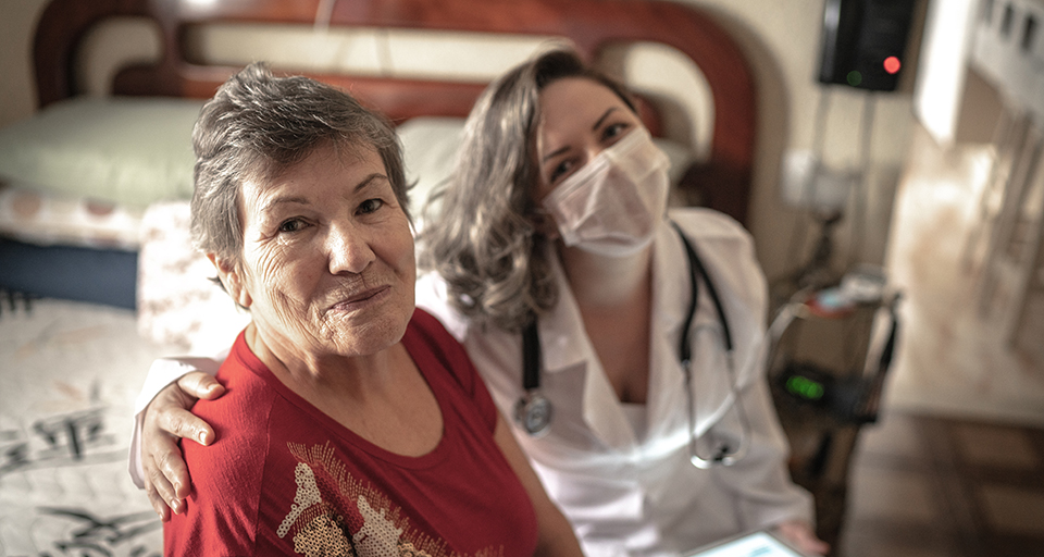 A stock photo of someone being cared for in their own home