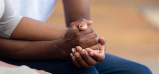 Stock photo of hand holding