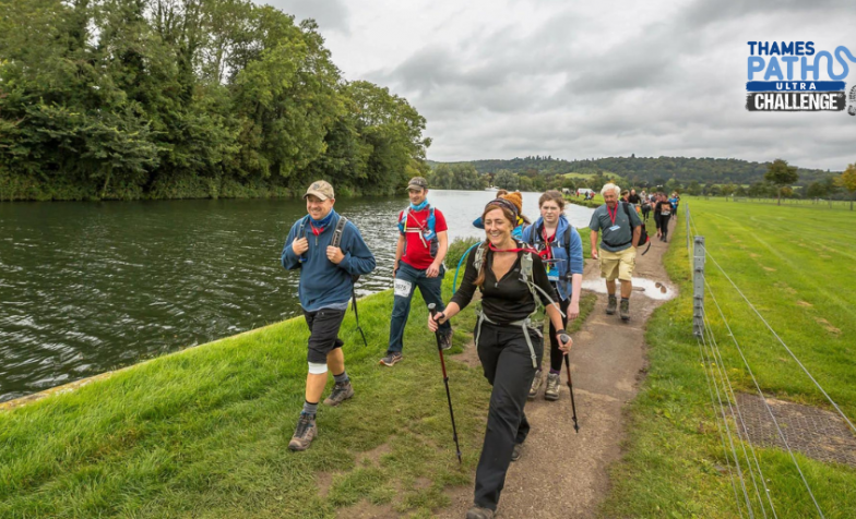 Walkers next to the River Thames