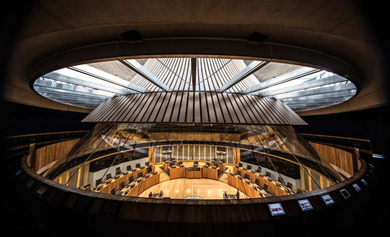 A wide shot of the interior Senedd building, the government building in Wales