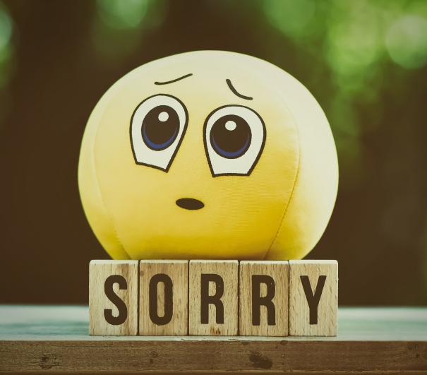A stock photo of some blocks saying sorry