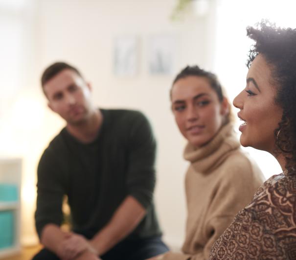 A group sitting in a circle in discussion