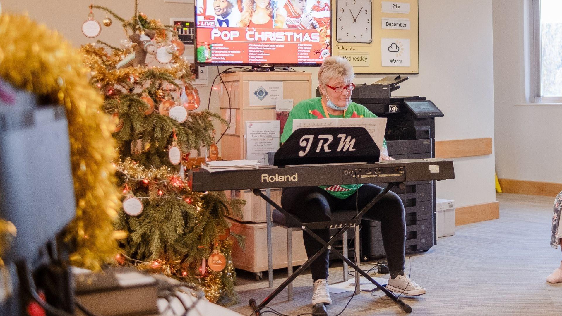 Jane has worked at St Giles for five years, and every Christmas she organises a singalong on the Inpatient Unit, gathering families, staff, and volunteers to sing carols around the piano