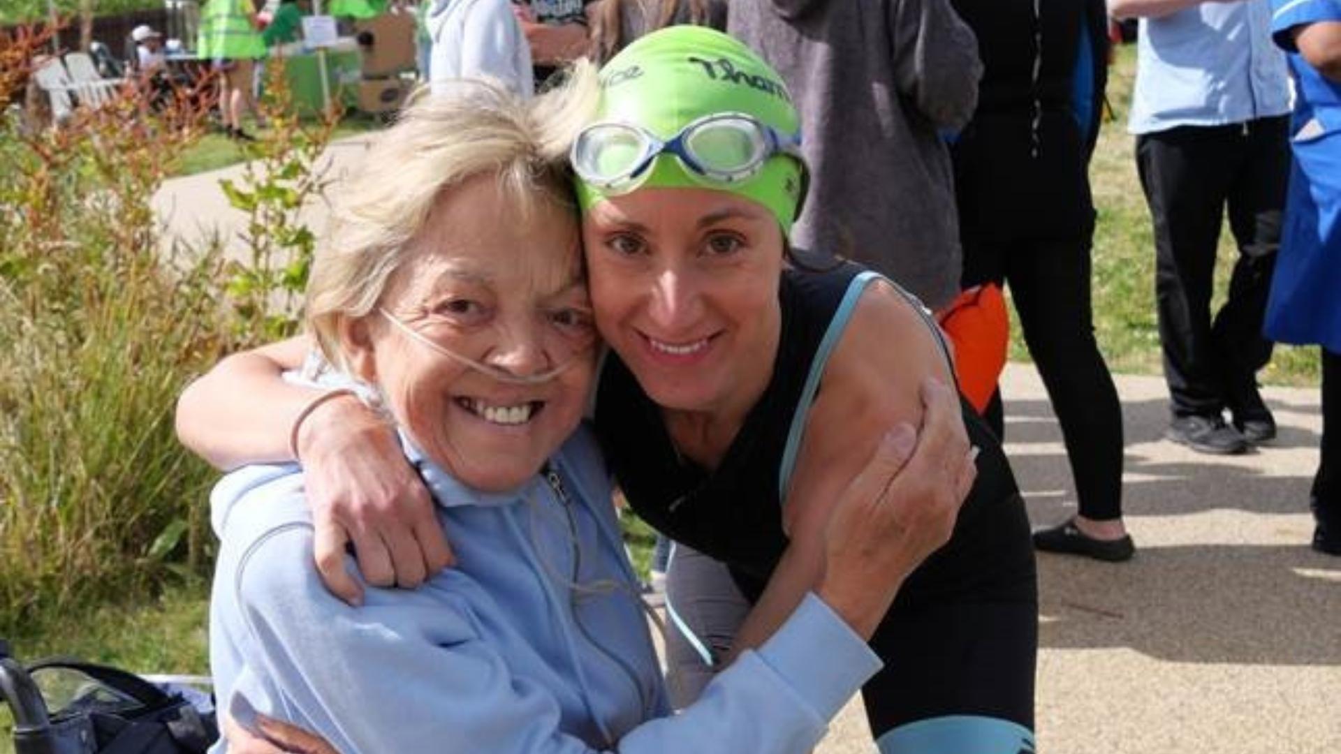 Senior Nurse Marta with her patient, Maria, at the hospice's open water swim