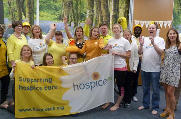 Staff at Hospice UK during a Go Yellow day to raise money for the charity