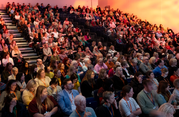 An auditorium full of people
