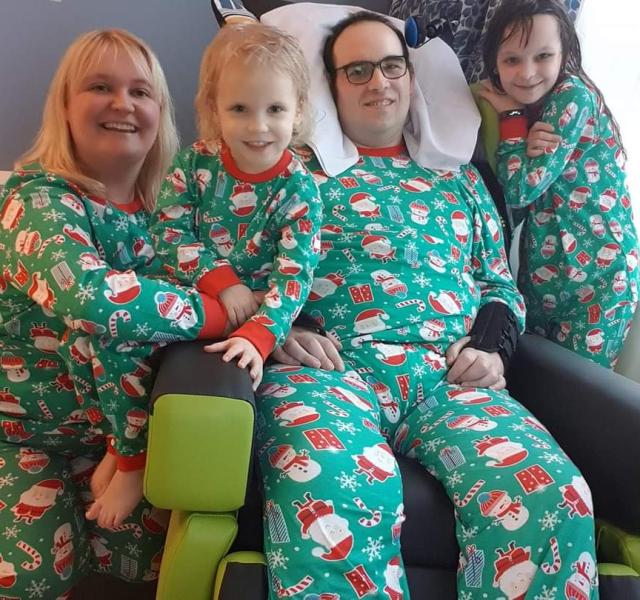 Sam, Rob and 2 of their children