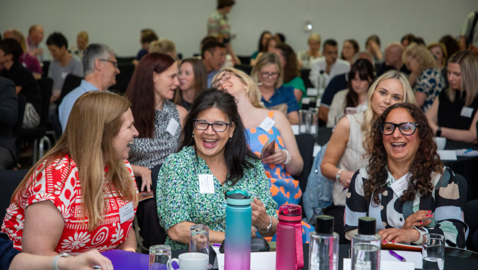 Image of 3 people attending a one day conference