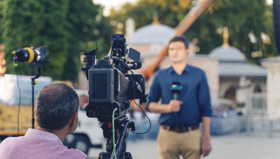 We're speaking up for hospices in the news - camera crew filming broadcast reporter