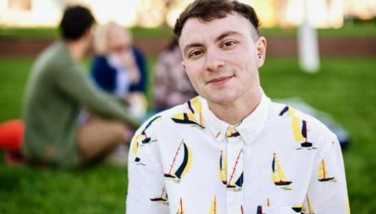 Young man smiling at camera